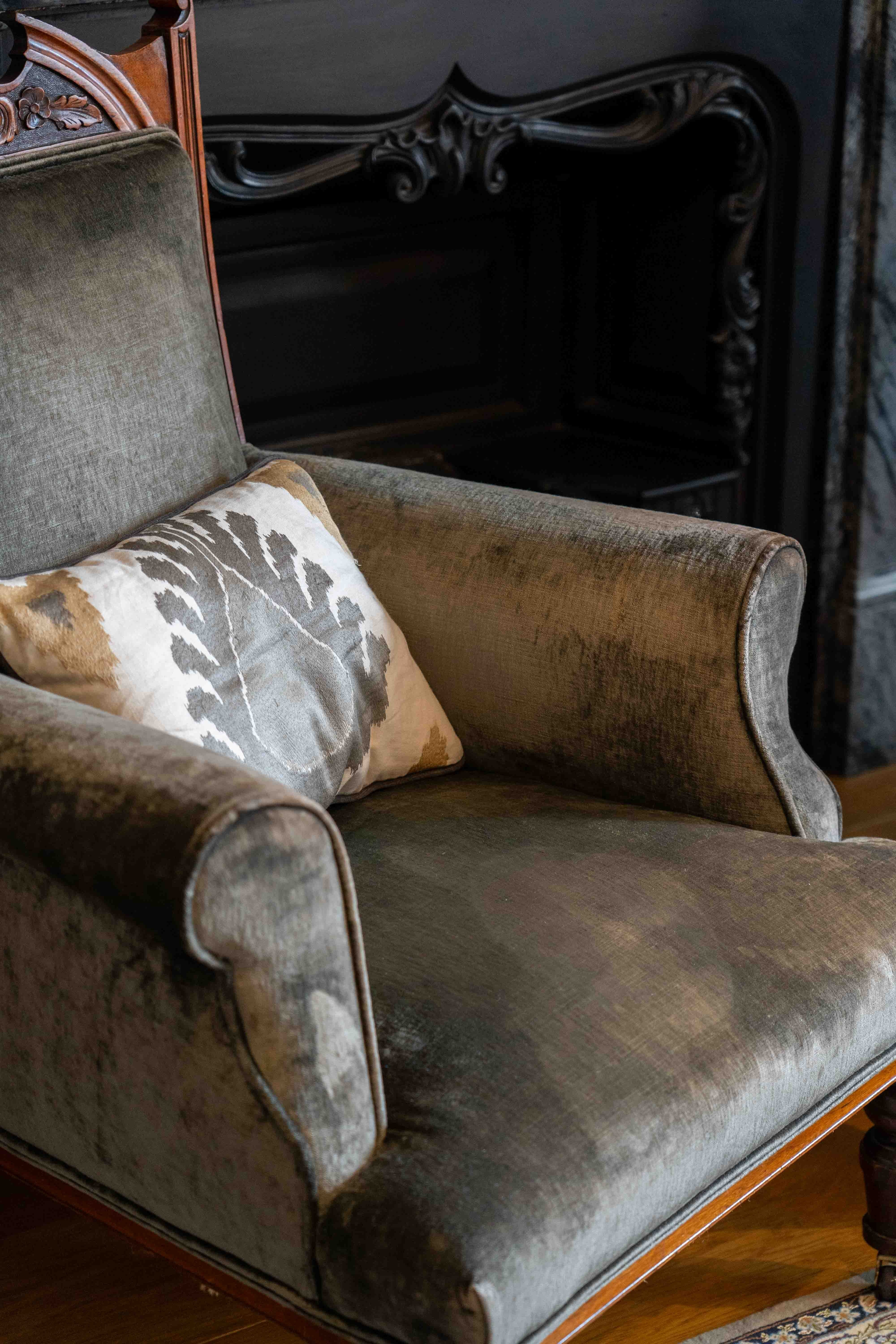 A pair of late Victorian upholstered walnut armchairs, width 73cm, depth 68cm, height 98cm. Condition - fair